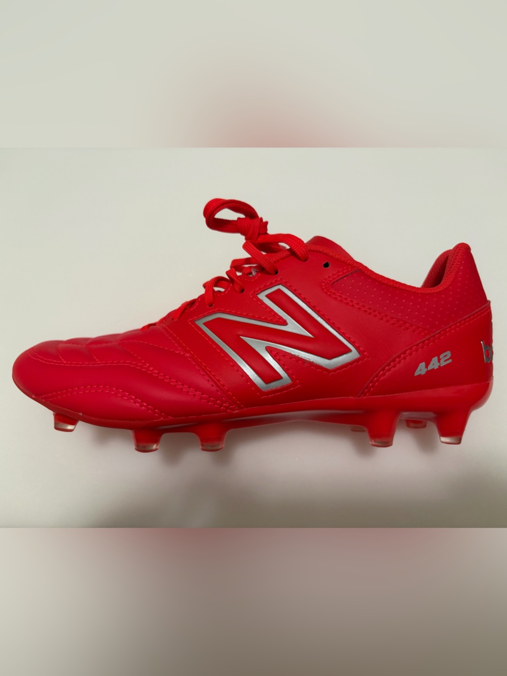 New Balance Red Soccer Cleat with Silver Logo
